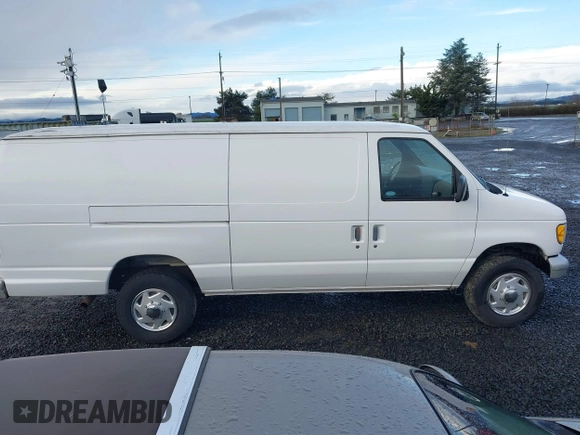 1996 Ford Econoline Cargo with VIN 1FTJS34H4THA69893, listed as a IAAI auction lot 41703257 with 206,503 mi miles and . Bid and sale history available at DreamBid. Image 13.