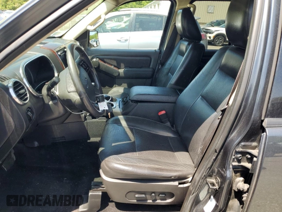 2010 Ford Explorer Limited with VIN 1FMEU8FE2AUA72433, listed as a Copart auction lot 59229735 with 228,387 mi miles and Salvage title. Bid and sale history available at DreamBid. Image 7.
