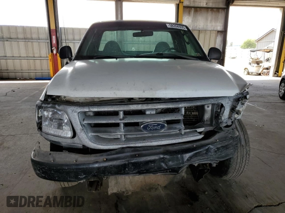 2003 Ford F-150 XL with VIN 1FTRF17243NB73840, listed as a Copart auction lot 58356935 with 332,670 mi miles and Salvage title. Bid and sale history available at DreamBid. Image 5.