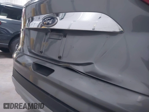 2014 Ford Escape SE с VIN 1FMCU9G9XEUD37491, выставлен на аукционе IAAI как лот 42000637 с пробегом 141 580 миль миль и . История ставок и продаж доступна на DreamBid. Изображение 6.