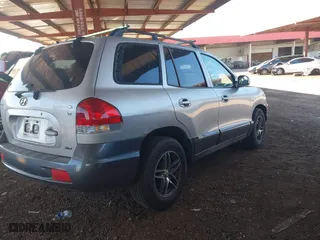 2005 Hyundai Santa Fe GLS with VIN KM8SC73D55U960384, listed as a IAAI auction lot 41872928 with 201,160 mi miles. Bid and sale history available at carsss.com. Image 4.