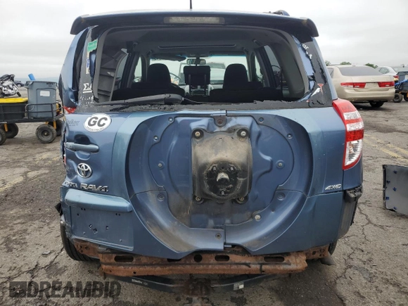 2010 Toyota RAV4 Sport with VIN JTMRF4DV3AD023902, listed as a Copart auction lot 60986045 with 155,321 mi miles and Salvage title. Bid and sale history available at DreamBid. Image 6.