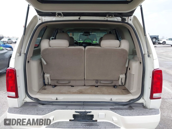 2005 Cadillac Escalade z VIN 1GYEK63N25R190908, wystawiony jako IAAI lot #41882135 z przebiegiem 243 333 mil mil oraz . Historia ofert i sprzedaży dostępna na DreamBid. Obrazek 17.