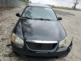 2009 Kia Spectra EX with VIN KNAFE221395026165, listed as a Copart auction lot 73715994 with 245,813 mi miles and Salvage Title. Bid and sale history available at carsss.com. Image 5.