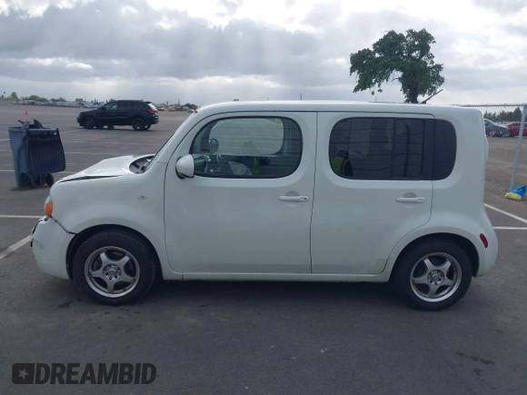 2010 Nissan Cube S z VIN JN8AZ2KRXAT161347, wystawiony jako IAAI lot #41921669 z przebiegiem 161 121 mil mil oraz . Historia ofert i sprzedaży dostępna na DreamBid. Obrazek 14.