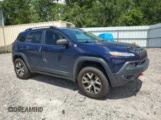 2014 Jeep Cherokee Trailhawk with VIN 1C4PJMBS7EW170345, listed as a Copart auction lot 60565765 with 98,382 mi miles and Salvage title. Bid and sale history available at DreamBid. Image 4.