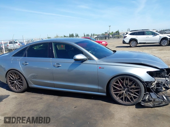 2013 Audi A6 Prestige z VIN WAUJGAFC2DN088630, wystawiony jako IAAI lot #42272569 z przebiegiem 110 324 mil mil oraz . Historia ofert i sprzedaży dostępna na DreamBid. Obrazek 14.