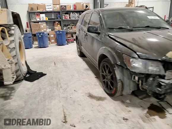 2014 Dodge Journey R/T z VIN 3C4PDCEG1ET167567, wystawiony jako Copart lot #45019695 z przebiegiem 133 095 mil mil oraz Szkoda całkowita • Salvage title. Historia ofert i sprzedaży dostępna na DreamBid. Obrazek 12.
