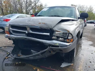 1998 Dodge Dakota SLT with VIN 1B7GL22Y5WS736756, listed as a IAAI auction lot 40687209 with 141,560 mi miles. Bid and sale history available at carsss.com. Image 6.