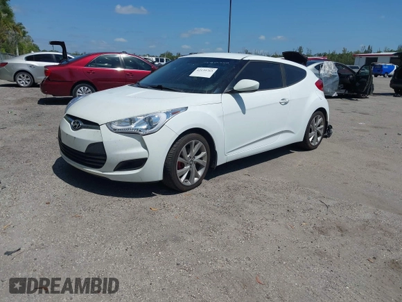2016 Hyundai Veloster with VIN KMHTC6AD3GU270895, listed as a IAAI auction lot 42139765 with 138,884 mi miles. Bid and sale history available at carsss.com. Image 2.