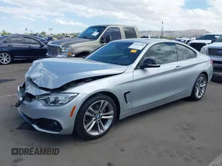 2015 BMW 4 Series 428i with VIN WBA3N7C54FK225045, listed as a IAAI auction lot 42042980 with 72,909 mi miles. Bid and sale history available at carsss.com. Image 2.