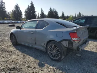 2011 Scion tC with VIN JTKJF5C76B3000765, listed as a Copart auction lot 53954445 with 243,554 mi miles and Salvage Title. Bid and sale history available at carsss.com. Image 2.