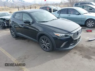 2017 Mazda CX-3 Touring z VIN JM1DKFC7XH0179795, wystawiony jako IAAI lot #41488717 z przebiegiem 92 244 mil mil oraz . Historia ofert i sprzedaży dostępna na DreamBid. Obrazek 1.