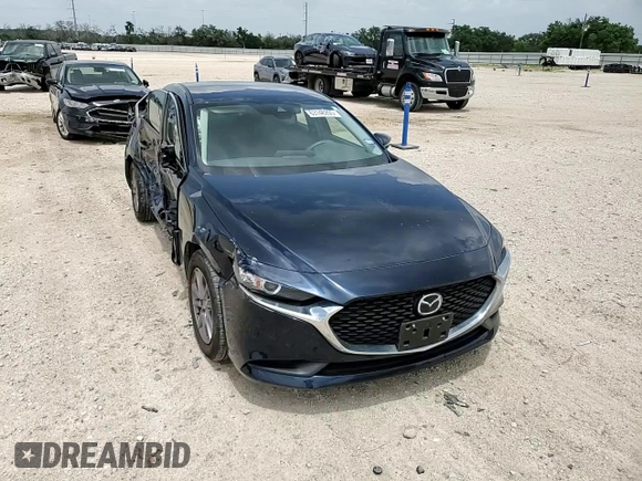 2021 Mazda 3 S z VIN JM1BPAAL3M1321131, wystawiony jako Copart lot #63148205 z przebiegiem 9 910 mil mil oraz Szkoda całkowita • Salvage title. Historia ofert i sprzedaży dostępna na DreamBid. Obrazek 13.