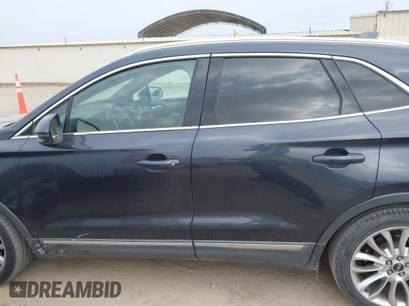 2015 Lincoln MKC with VIN 5LMCJ1A94FUJ13716, listed as a IAAI auction lot 41911220 with 194,825 mi miles. Bid and sale history available at carsss.com. Image 14.