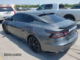 2020 Nissan Maxima SR with VIN 1N4AA6EVXLC383592, listed as a IAAI auction lot 42058071 with 103,014 mi miles and . Bid and sale history available at DreamBid. Image 3.