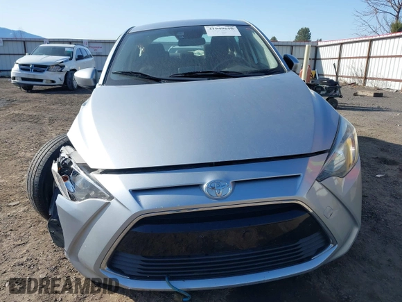 2018 Toyota Yaris with VIN 3MYDLBYV8JY328229, listed as a IAAI auction lot 41949610 with 54,651 mi miles and . Bid and sale history available at DreamBid. Image 13.