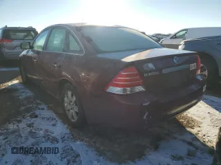 2005 Mercury Montego Luxury z VIN 1MEFM40125G601261, wystawiony jako Copart lot #88334305 z przebiegiem Nie podano mil oraz Szkoda całkowita • Salvage title. Historia ofert i sprzedaży dostępna na DreamBid. Obrazek 2.
