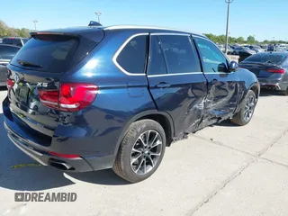 2017 BMW X5 xDrive50i z VIN 5UXKR6C32H0U13751, wystawiony jako IAAI lot #41834968 z przebiegiem 112 155 mil mil oraz . Historia ofert i sprzedaży dostępna na DreamBid. Obrazek 4.