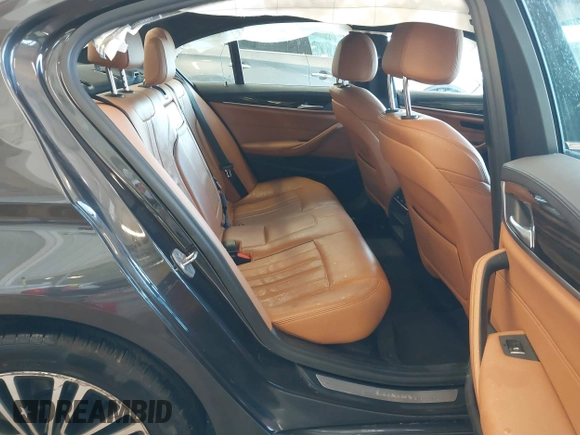 2018 BMW 5 Series 530i xDrive with VIN WBAJA7C55JWA73459, listed as a IAAI auction lot 41634921 with 64,759 mi miles and . Bid and sale history available at DreamBid. Image 8.
