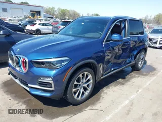 2021 BMW X5 sDrive40i with VIN 5UXCR4C03M9F14479, listed as a IAAI auction lot 41884878 with 1 mi miles. Bid and sale history available at carsss.com. Image 2.