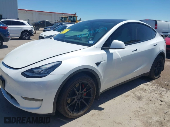 2022 Tesla Model Y Long Range z VIN 7SAYGDEE3NF426481, wystawiony jako IAAI lot #42076729 z przebiegiem 21 648 mil mil oraz . Historia ofert i sprzedaży dostępna na DreamBid. Obrazek 2.