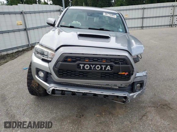 2019 Toyota Tacoma SR with VIN 3TMCZ5AN2KM193701, listed as a Copart auction lot 56776385 with 112,990 mi miles and Salvage title. Bid and sale history available at DreamBid. Image 5.
