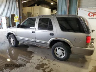 2000 Chevrolet Blazer LT z VIN 1GNDT13W1Y2282557, wystawiony jako Copart lot #55560775 z przebiegiem 219 795 mil mil oraz Szkoda całkowita • Salvage title. Historia ofert i sprzedaży dostępna na DreamBid. Obrazek 2.