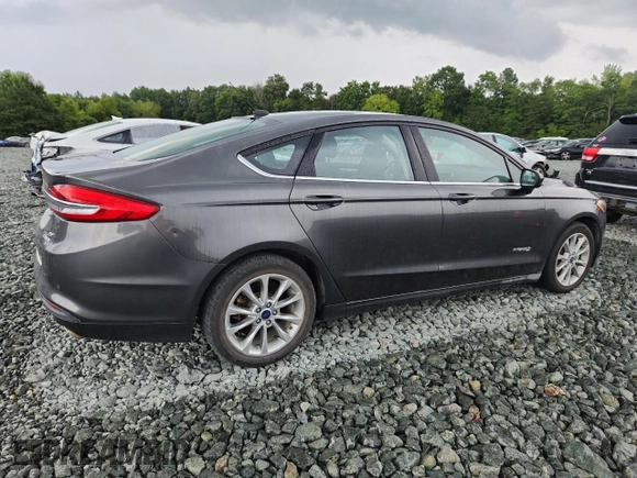 2017 Ford Fusion Hybrid SE with VIN 3FA6P0LU1HR269808, listed as a Copart auction lot 65921915 with 201,903 mi miles and Clean title. Bid and sale history available at DreamBid. Image 3.