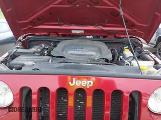 2013 Jeep Wrangler Sport z VIN 1C4GJWAG0DL543850, wystawiony jako IAAI lot #42374916 z przebiegiem 163 977 mil mil oraz . Historia ofert i sprzedaży dostępna na DreamBid. Obrazek 10.