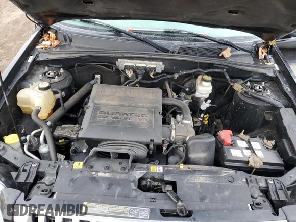 2009 Mercury Mariner with VIN 4M2CU91G09KJ05411, listed as a Copart auction lot 82391844 with 132,990 mi miles and Clean title. Bid and sale history available at DreamBid. Image 13.
