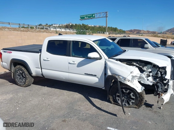 2019 Toyota Tacoma 4WD SR5 with VIN 3TMDZ5BN1KM079305, listed as a IAAI auction lot 41247804 with 98,494 mi miles. Bid and sale history available at carsss.com. Image 13.