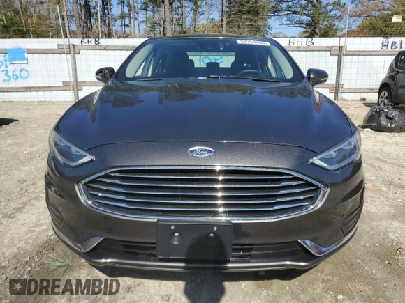 2020 Ford Fusion SEL z VIN 3FA6P0CD7LR196193, wystawiony jako Copart lot #53254465 z przebiegiem 79 944 mil mil oraz Szkoda całkowita • Salvage title. Historia ofert i sprzedaży dostępna na DreamBid. Obrazek 5.