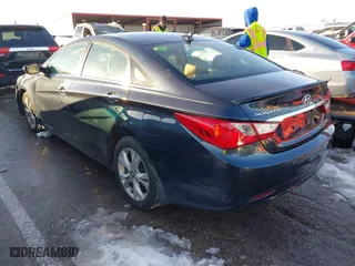 2013 Hyundai Sonata SE with VIN 5NPEC4AC4DH543471, listed as a IAAI auction lot 41267966 with 143,471 mi miles. Bid and sale history available at carsss.com. Image 3.