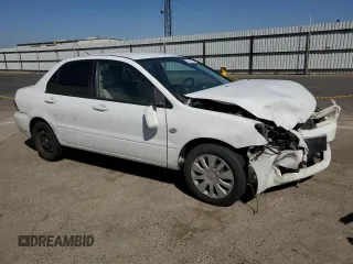 2006 Mitsubishi Lancer ES with VIN JA3AJ26E06U008194, listed as a Copart auction lot 72812724 with 140,432 mi miles and Salvage Title. Bid and sale history available at DreamBid. Image 4.
