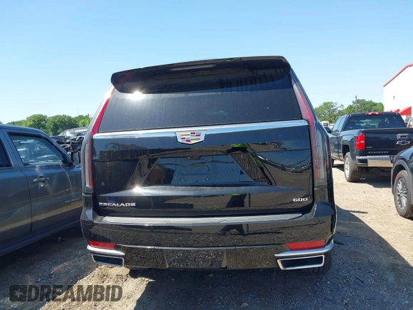 2023 Cadillac Escalade 4WD Premium Luxury with VIN 1GYS4BKL0PR409325, listed as a IAAI auction lot 41973567 with 32,398 mi miles and . Bid and sale history available at DreamBid. Image 16.