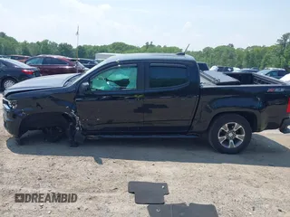 2019 Chevrolet Colorado 4WD Z71 with VIN 1GCGTDEN2K1157205, listed as a IAAI auction lot 42436614 with 115,801 mi miles and . Bid and sale history available at DreamBid. Image 15.