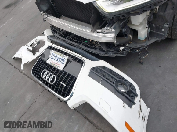 2015 Audi Q3 2.0T Premium Plus with VIN WA1EFCFS9FR002651, listed as a IAAI auction lot 41755613 with 111,281 mi miles. Bid and sale history available at carsss.com. Image 12.