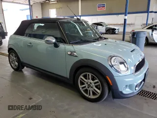 2012 MINI Convertible S с VIN WMWZP3C55CT249664, выставлен на аукционе Copart как лот 63120145 с пробегом 59 197 миль миль и Списание • Salvage title. История ставок и продаж доступна на DreamBid. Изображение 4.