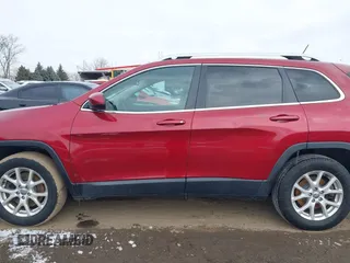 2014 Jeep Cherokee Latitude with VIN 1C4PJMCS2EW175306, listed as a IAAI auction lot 41620115 with 156,578 mi miles and . Bid and sale history available at carsss.com. Image 14.