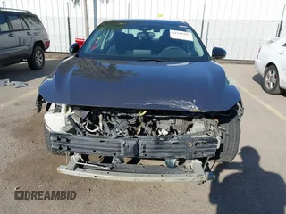 2021 Nissan Sentra SR z VIN 3N1AB8DV0MY290032, wystawiony jako IAAI lot #41819281 z przebiegiem 265 088 mil mil oraz . Historia ofert i sprzedaży dostępna na DreamBid. Obrazek 13.