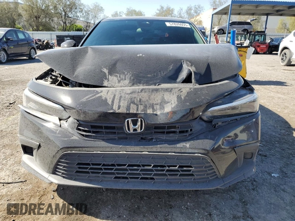 2023 Honda Civic Sport with VIN 2HGFE2F52PH526843, listed as a Copart auction lot 57826055 with 28,758 mi miles and Salvage title. Bid and sale history available at DreamBid. Image 5.