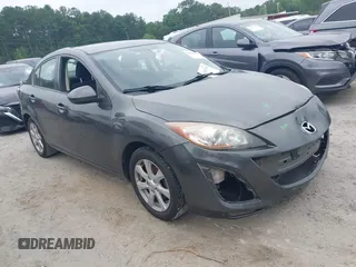 2011 Mazda 3 i Touring with VIN JM1BL1VF8B1408987, listed as a IAAI auction lot 42561334 with 128,857 mi miles and . Bid and sale history available at DreamBid. Image 1.