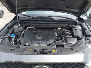2021 Mazda CX-5 Touring with VIN JM3KFACM1M0461510, listed as a IAAI auction lot 41660439 with 30,352 mi miles. Bid and sale history available at carsss.com. Image 10.