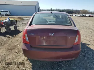 2006 Hyundai Accent GLS with VIN KMHCN46C66U038319, listed as a Copart auction lot 46668495 with 194,499 mi miles and Salvage Title. Bid and sale history available at carsss.com. Image 6.