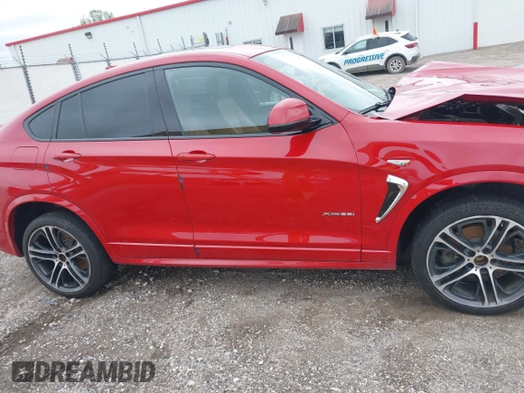 2018 BMW X4 xDrive28i z VIN 5UXXW3C57J0Z60681, wystawiony jako IAAI lot #42014416 z przebiegiem 65 168 mil mil oraz . Historia ofert i sprzedaży dostępna na DreamBid. Obrazek 14.