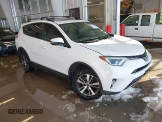 2017 Toyota RAV4 XLE with VIN JTMWFREV0HJ716663, listed as a IAAI auction lot 41256607 with 101,641 mi miles. Bid and sale history available at carsss.com. Image 1.