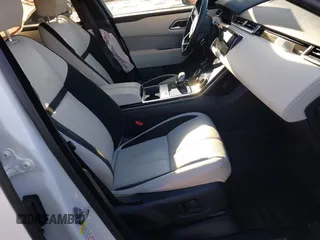 2022 Land Rover Range Rover Velar R-Dynamic S z VIN SALYT2EX7NA341627, wystawiony jako IAAI lot #41111238 z przebiegiem 18 982 mil mil oraz . Historia ofert i sprzedaży dostępna na DreamBid. Obrazek 5.
