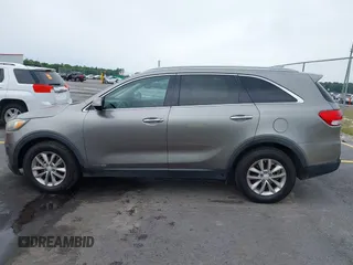 2016 Kia Sorento LX with VIN 5XYPGDA51GG012335, listed as a IAAI auction lot 42224249 with 166,752 mi miles and . Bid and sale history available at DreamBid. Image 14.