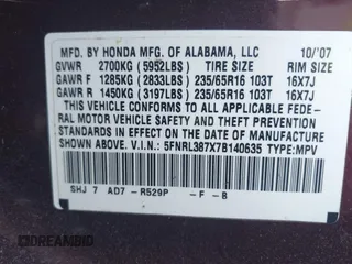 2007 Honda Odyssey EX-L with VIN 5FNRL387X7B140635, listed as a IAAI auction lot 42036807 with 292,774 mi miles. Bid and sale history available at carsss.com. Image 9.